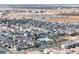 Aerial view of community with pool and numerous houses at 10993 W Pierce St, Avondale, AZ 85323