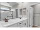 Modern bathroom with double vanity and walk-in shower at 10993 W Pierce St, Avondale, AZ 85323