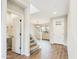 Inviting entryway showcasing staircase and tile flooring at 10993 W Pierce St, Avondale, AZ 85323