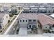 Two-story house with attached garage and neutral color palette at 10993 W Pierce St, Avondale, AZ 85323