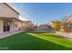 Artificial turf backyard, patio, and trampoline at 11640 W Duran Ave, Youngtown, AZ 85363