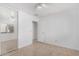 Well-lit bedroom with mirrored closet and ceiling fan at 11640 W Duran Ave, Youngtown, AZ 85363