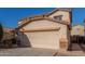 Two-story house with a large driveway and desert landscaping at 11640 W Duran Ave, Youngtown, AZ 85363