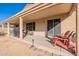 Covered patio with grill and seating area at 1227 W Delmonte Dr, Casa Grande, AZ 85122