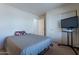 Spacious bedroom with double bed and sliding door closet at 1227 W Delmonte Dr, Casa Grande, AZ 85122