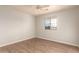 Bedroom with hardwood floors and ceiling fan at 12677 N 140Th Dr, Surprise, AZ 85379