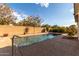 Relaxing rectangular pool in sunny backyard at 12677 N 140Th Dr, Surprise, AZ 85379