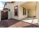 Side porch with two windows and access to backyard at 12677 N 140Th Dr, Surprise, AZ 85379