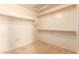 Spacious walk-in closet with double rods and ample shelving at 12677 N 140Th Dr, Surprise, AZ 85379