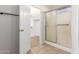 Clean bathroom with shower and closet access at 14033 W Two Guns Trl, Surprise, AZ 85374