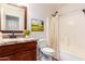 Functional bathroom featuring a vanity with granite countertop and a shower-tub combination at 14033 W Two Guns Trl, Surprise, AZ 85374