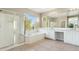 Elegant bathroom with double vanity, soaking tub and shower at 1440 S Central Dr, Chandler, AZ 85286