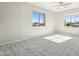 Well-lit bedroom with carpet flooring and large windows at 1440 S Central Dr, Chandler, AZ 85286