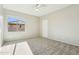 Well-lit bedroom with carpet flooring and a window at 1440 S Central Dr, Chandler, AZ 85286