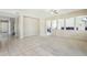 Bright and airy living room with neutral carpeting and tile flooring at 1440 S Central Dr, Chandler, AZ 85286