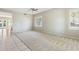 Bright and airy living room with neutral colored floors and carpeting at 1440 S Central Dr, Chandler, AZ 85286