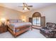 Spacious bedroom with wood furniture and large window at 15225 N Bluejay Pl, Fountain Hills, AZ 85268