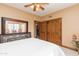 Bedroom with large mirror and double doors at 15225 N Bluejay Pl, Fountain Hills, AZ 85268