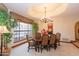 Formal dining room with a chandelier and large windows at 15225 N Bluejay Pl, Fountain Hills, AZ 85268