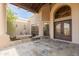 Front entry with fountain and sitting area at 15225 N Bluejay Pl, Fountain Hills, AZ 85268