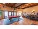 Game room with pool table, wet bar, and access to patio at 15225 N Bluejay Pl, Fountain Hills, AZ 85268