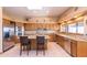 Spacious kitchen featuring granite countertops and stainless steel appliances at 15225 N Bluejay Pl, Fountain Hills, AZ 85268