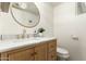 Elegant bathroom with a marble vanity and gold fixtures at 1531 W Colter St # 10, Phoenix, AZ 85015