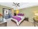 Spacious bedroom with private balcony and ceiling fan at 16 W Encanto Blvd -- # 128, Phoenix, AZ 85003