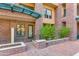 Brick building exterior with private entrance and landscaping at 16 W Encanto Blvd -- # 128, Phoenix, AZ 85003