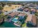 Aerial view showing home with pool, neighborhood and mountains at 1610 W Maplewood St, Chandler, AZ 85286