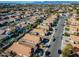 Aerial view of house and neighborhood, showcasing surrounding homes and streets at 1610 W Maplewood St, Chandler, AZ 85286