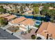 Aerial view of house on the lake with private pool and backyard at 1610 W Maplewood St, Chandler, AZ 85286