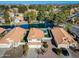 Aerial view of canal front home with pool and neighborhood at 1610 W Maplewood St, Chandler, AZ 85286