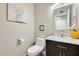 Modern bathroom with marble vanity and updated fixtures at 1610 W Maplewood St, Chandler, AZ 85286