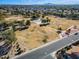 Aerial view of a neighborhood park with open green space and trees at 1610 W Maplewood St, Chandler, AZ 85286