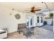 Covered patio features a ceiling fan and comfy seating area at 1610 W Maplewood St, Chandler, AZ 85286