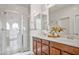 Bathroom with double vanity and walk-in shower at 1693 E Dogwood Ln, Gilbert, AZ 85295