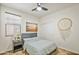 Bedroom with double bed and ceiling fan at 1693 E Dogwood Ln, Gilbert, AZ 85295