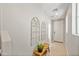 Bright entryway with wood bench and decorative wall accents at 1693 E Dogwood Ln, Gilbert, AZ 85295