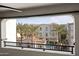 Balcony view of the community pool and mountain range at 17680 N 77Th Pl, Scottsdale, AZ 85255