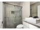 Modern bathroom with a walk-in shower and floating vanity at 17680 N 77Th Pl, Scottsdale, AZ 85255