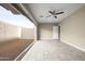 Bedroom with tiled floors and sliding glass doors to a patio at 17680 N 77Th Pl, Scottsdale, AZ 85255