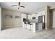 Modern kitchen with white cabinets and a large island at 17680 N 77Th Pl, Scottsdale, AZ 85255