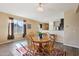 Eat-in kitchen with a wooden table and chairs at 19371 N Nocera Rd, Maricopa, AZ 85138