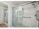 Bathroom with a large walk-in shower at 19619 N Signal Butte Cir, Sun City, AZ 85373