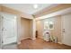 Bedroom with wood flooring and access to bath at 19619 N Signal Butte Cir, Sun City, AZ 85373