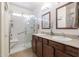 Bathroom with a walk-in shower and double vanity at 21081 E Via De Olivos --, Queen Creek, AZ 85142