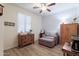 Relaxing bedroom with comfortable seating and wood storage at 21081 E Via De Olivos --, Queen Creek, AZ 85142