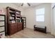 Bright bedroom with built-in shelving and window at 21081 E Via De Olivos --, Queen Creek, AZ 85142