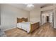 Bedroom with wood flooring and ceiling fan at 21964 N 59Th Ln, Glendale, AZ 85310